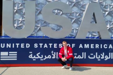 Youth Ambassador Denison Kappas in front of the Expo 2020 Dubai USA Pavilion