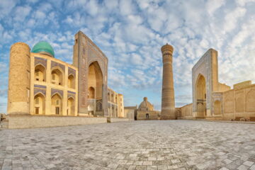 Panoramic view of Poi Kalan - an islamic religious complex located around the Kalan minaret in Bukhara, Uzbekistan
