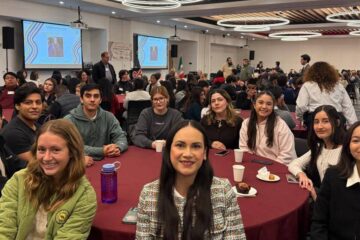 A group of people posing for the camera