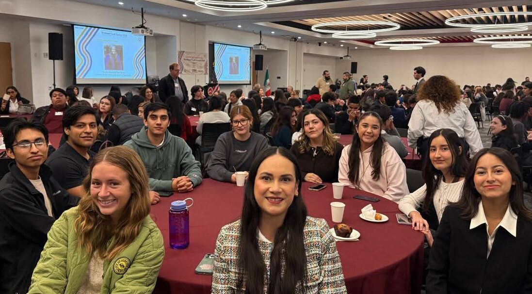 A group of people posing for the camera