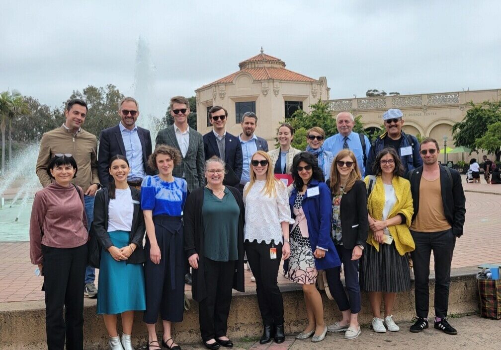 A group of IVLP participants pose in front of a fountain in Balboa Park.